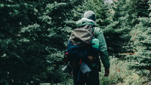 Carrying a tent outside a Backpack