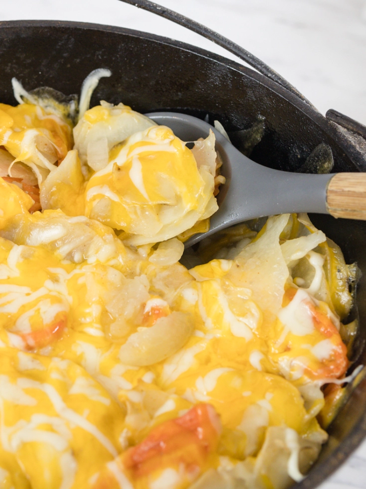 Dutch Oven Cheesy Potatoes